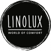 Zwart-wit logo van Linolux met de tekst World of Comfort in een cirkel.