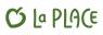 Logo van La Place met groene tekst en een gestileerde appel.