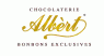 Logo van Chocolaterie Albèrt met de tekst Bonbons Exclusives in stijlvolle gouden letters.
