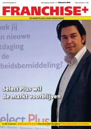 Man in pak naast projectiescherm met tekst over Select Plus en franchising op cover van Franchise Plus februari 2012.