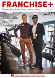 Twee mannen poseren in een sportschool met fitnessapparatuur op de voorgrond, onder vermelding van Anytime Fitness.