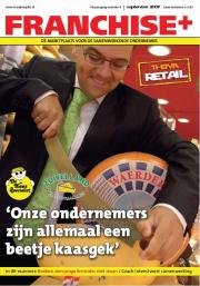Man in pak snijdt een grote kaas aan op de cover van Franchise+ september 2007, met tekst Onze ondernemers zijn allemaal e...